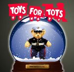 Toys for Tots Logo with Officer Bear in Brown and Black and White Shirt, Grey Pants with Red Striping. Toys for Tots Lettering White with Red outside Border. Snow globe is Blue with white snow with Brown bottom with Gold Plaque.